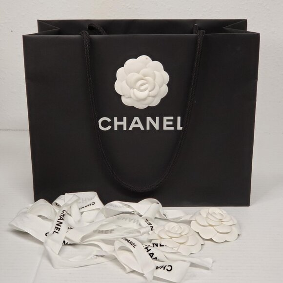 Black CHANEL Paper Gift Bag and 2 White Camelia Ribbon Flowers - Picture 1 of 9
